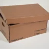Close-up photo of an open cardboard box labeled "Farm Raised" and "Product of USA Wild"