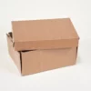A close-up photo of a cardboard box with its flaps open