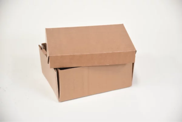 A close-up photo of a cardboard box with its flaps open