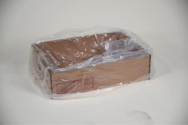 A cardboard box partially filled with a clear plastic bag, sits on a white background. The text "6″ Liner" is printed on the side of the box.