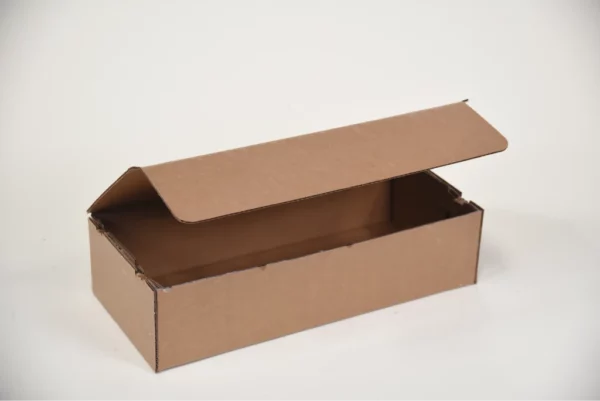 A small cardboard box with a self-locking wetlock closure, sitting on a table.
