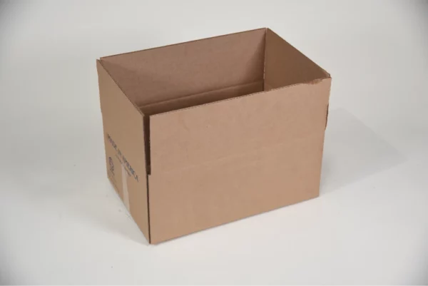 Open brown cardboard box on a white surface.