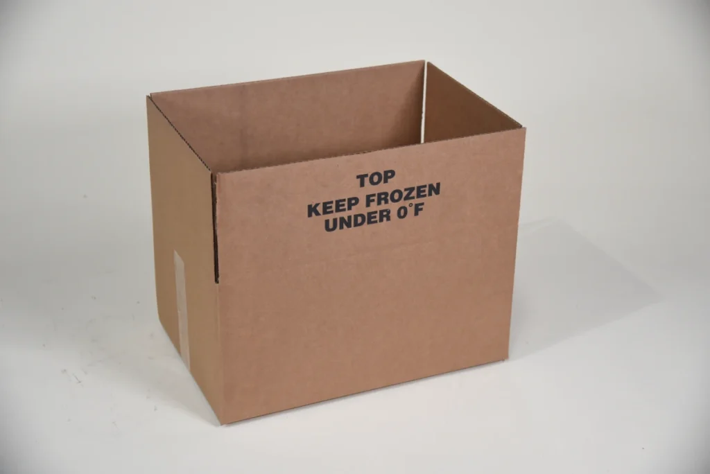 A cardboard box with the text saying "TOP KEEP FROZEN UNDER O°F".